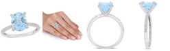 Delmar Blue Topaz (3-3/4 ct.t.w.) and Diamond (1/10 ct.t.w.) Ring in 10k White Gold